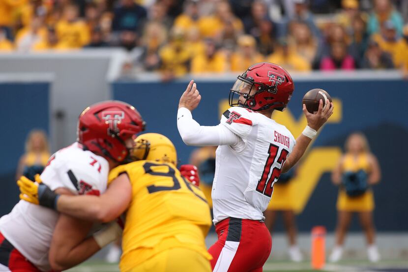 Texas Tech quarterback Tyler Shough passes during the first half of an NCAA college football...