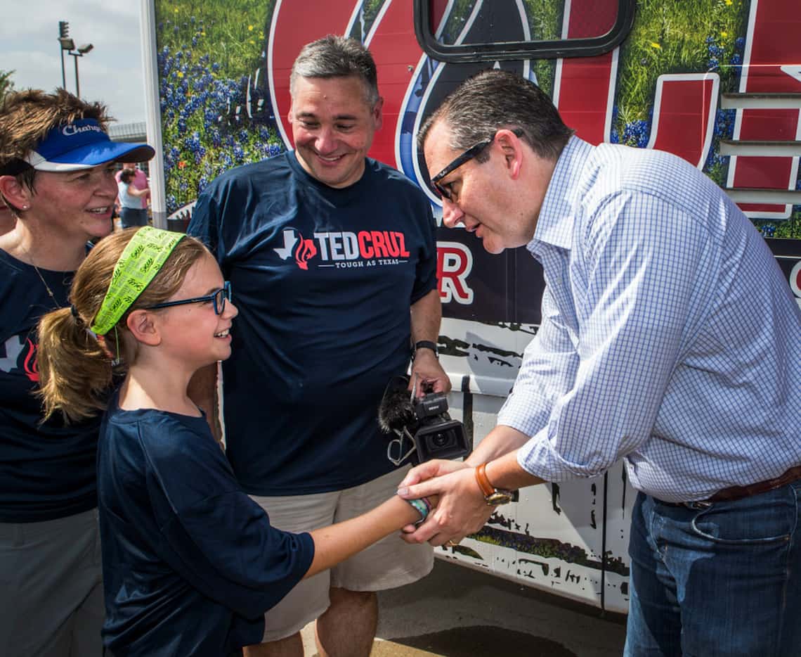 Campbell Steinhagen, 10, of McLendon-Chisholm shakes hands with Sen. Ted Cruz as her...