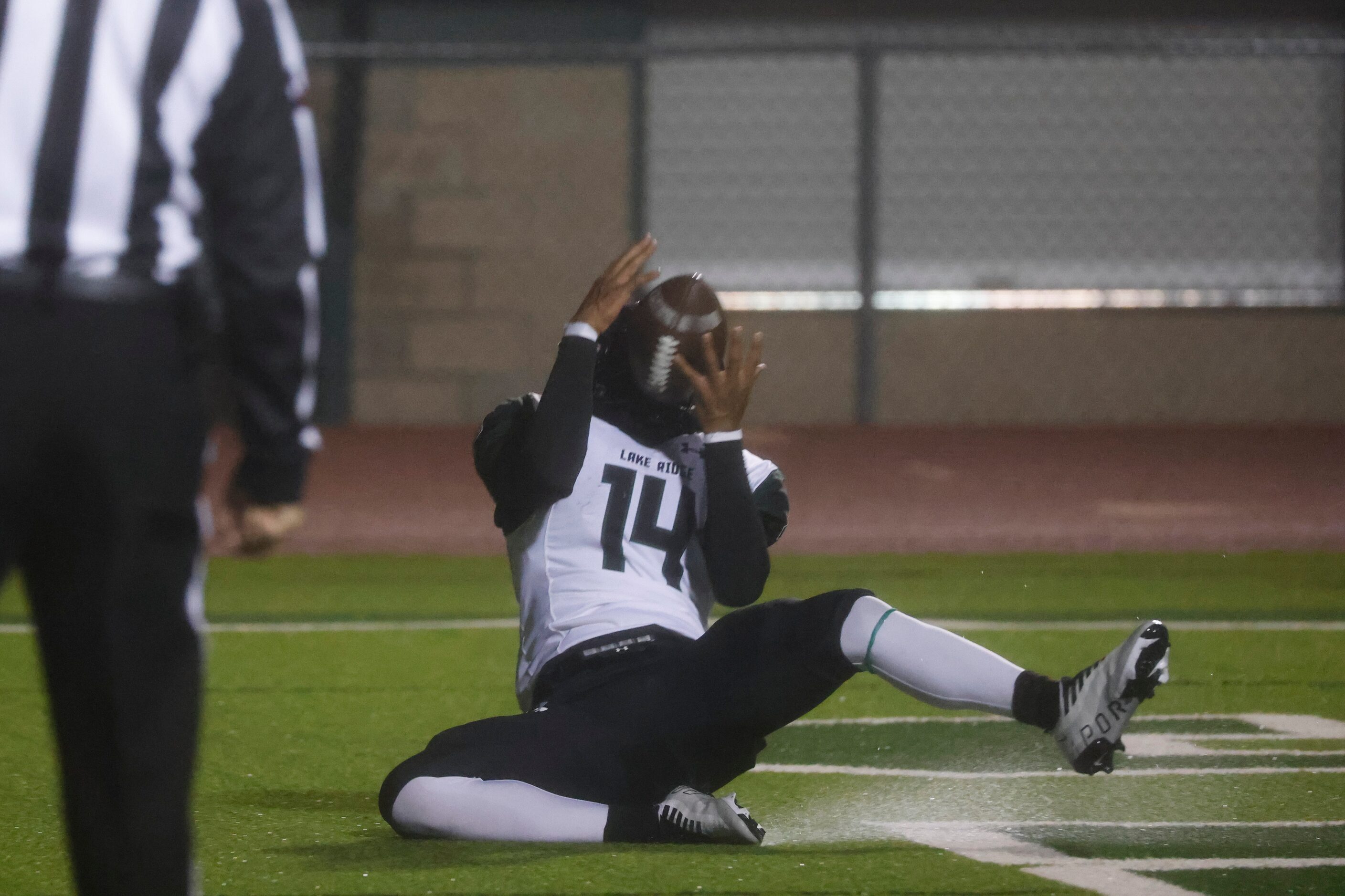 Mansfield Lake Ridge high’s Jamaal Hall (14) completes a touchdown against Waxahachie high...