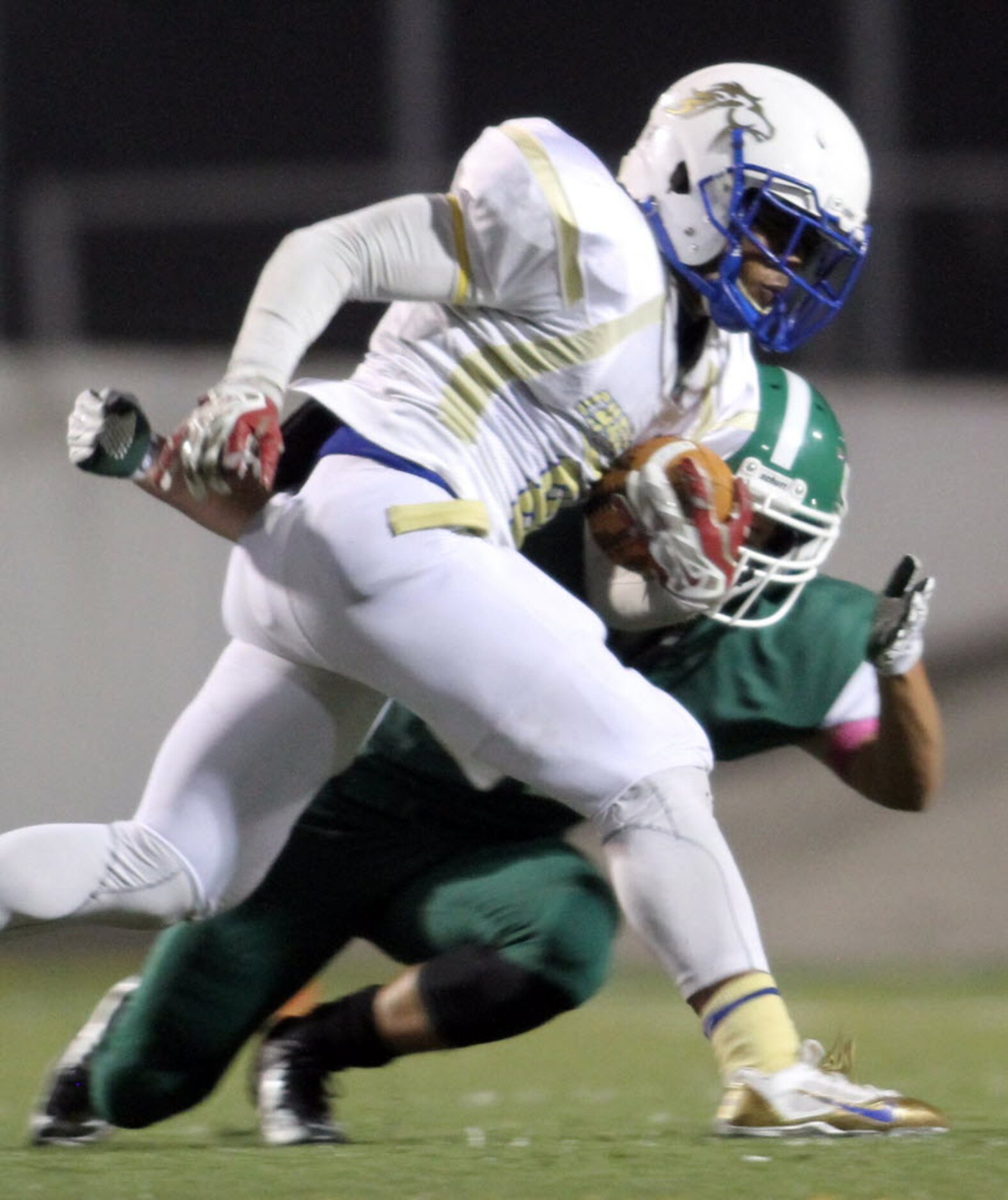 Conrad running back Duke Toweh (8) rushes for a first down as Bryan Adams defensive back...