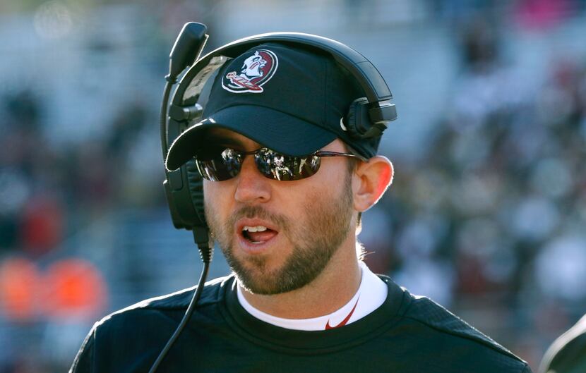 Florida State offensive coordinator Kendal Briles works on the sideline in the second half...