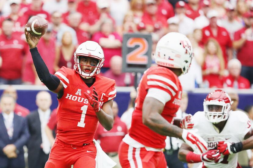 HOUSTON, TX - SEPTEMBER 03:  Greg Ward Jr. #1 of the Houston Cougars drops back to pass in...