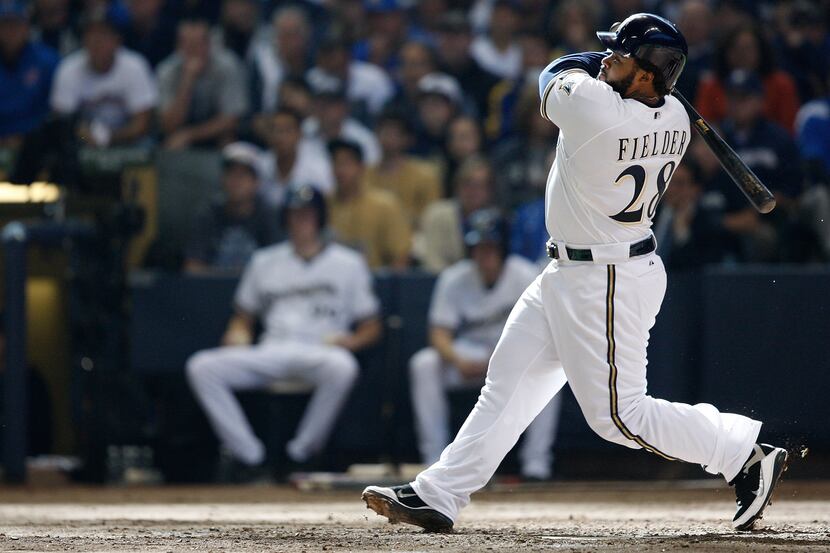 Prince Fielder #28 of the Milwaukee Brewers hits a two run home run in the 7th inning...