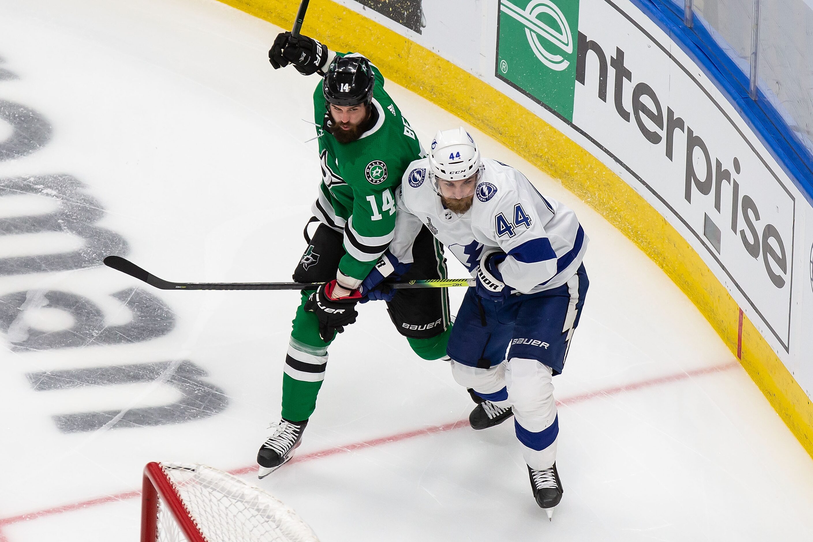 Jamie Benn (14) of the Dallas Stars battles against Jan Rutta (44) of the Tampa Bay...