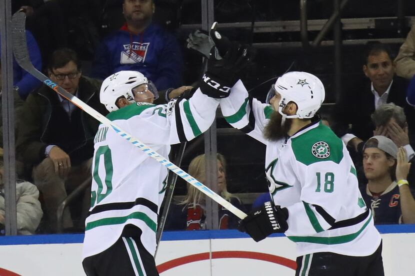 NEW YORK, NY - JANUARY 17:  Cody Eakin #20 of the Dallas Stars (L) celebrates his goal...