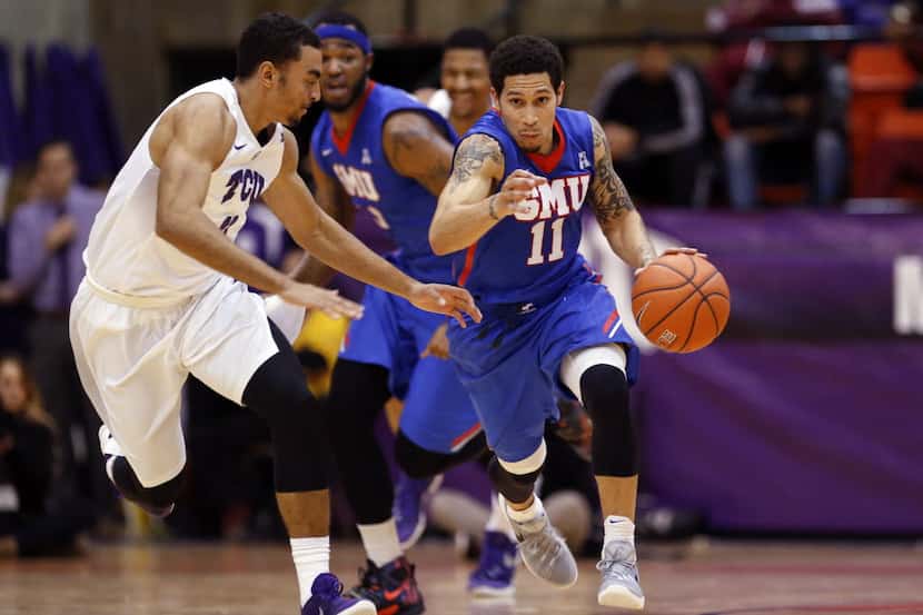 Dec 2, 2015; Fort Worth, TX, USA; Southern Methodist Mustangs guard Nic Moore (11) dribbles...