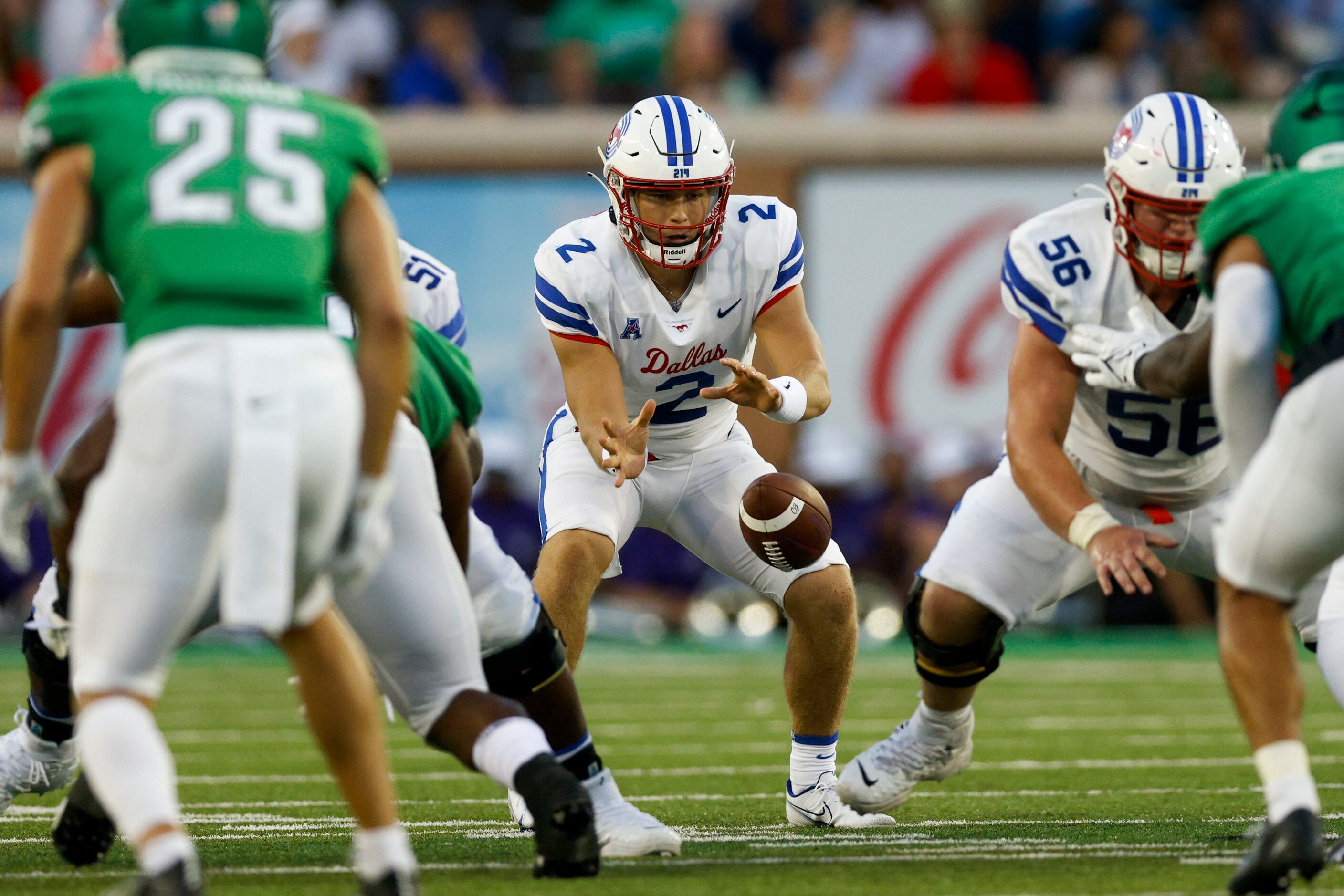 SMU quarterback Preston Stone (2) takes the snap during the first quarter of a game against...