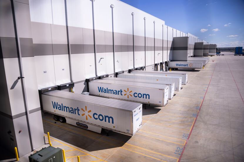 Trailers sit outside of Walmart’s online fulfillment center in Lancaster ready to be either...