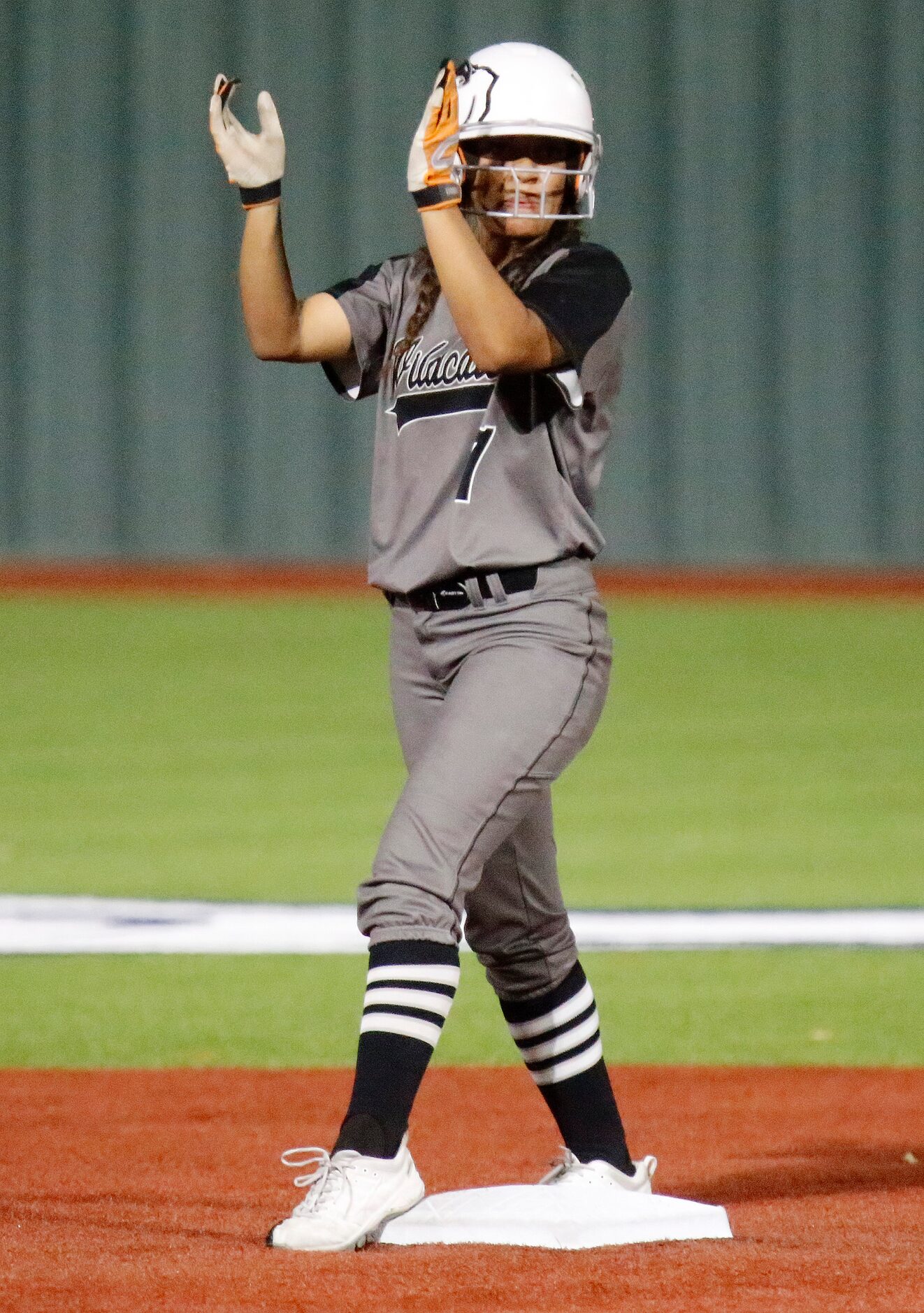 Denton Guyer High School designated hitter Avery Jefferson (1) celebrates her stand up...