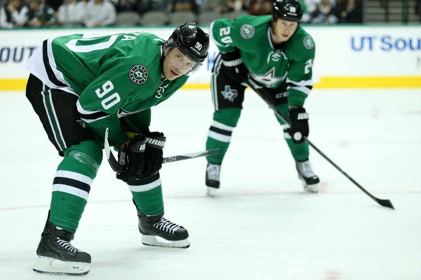 Dallas Stars center Jason Spezza (90) prepares for a face-off in the second period during a...