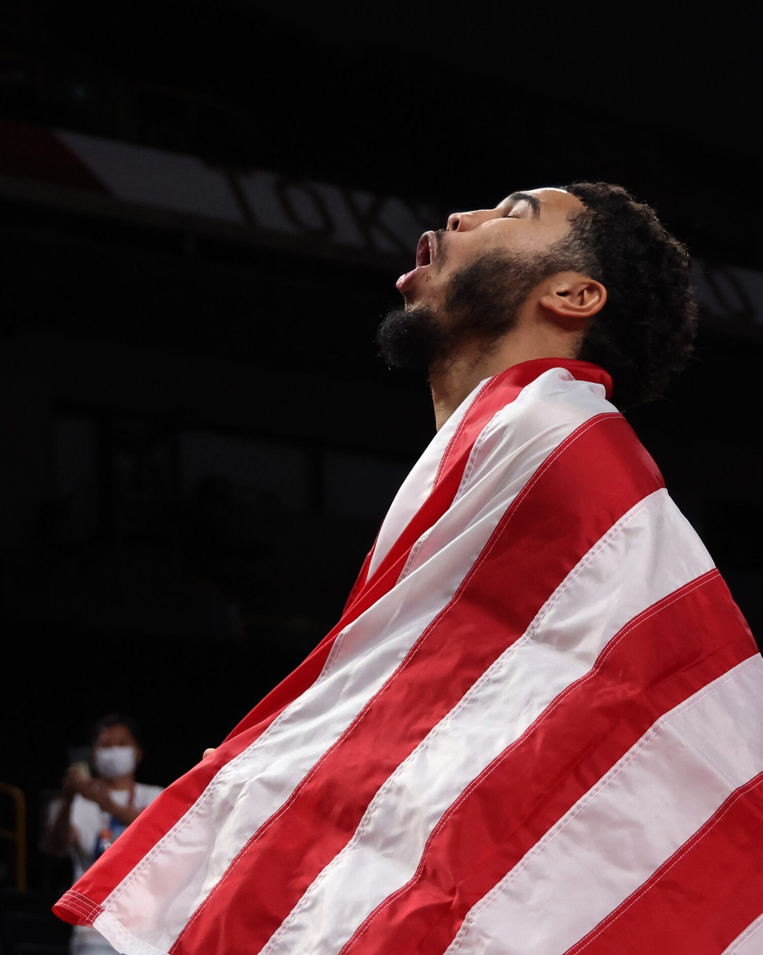 USA’s Jayson Tatum (10) celebrates with teammates after defeating France in the gold medal...