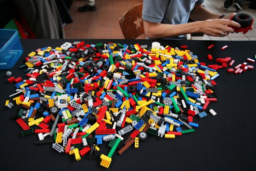 A puddle of Legos waits to be used by Lego builder Ian Paige during the build-off...