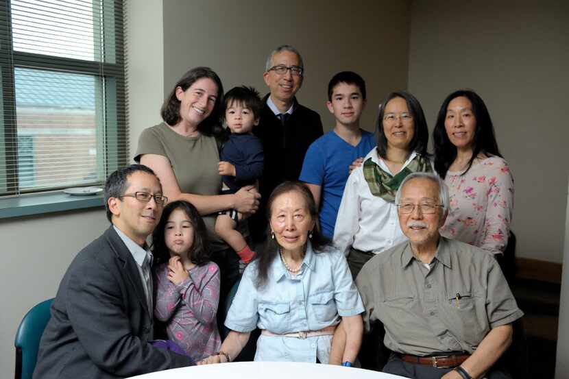 The family gathered for a photo last year. By May 2016, Thomas Huang (standing in the back)...