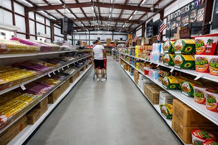 A customer walks around Nelson's Fireworks store in Rockwall.