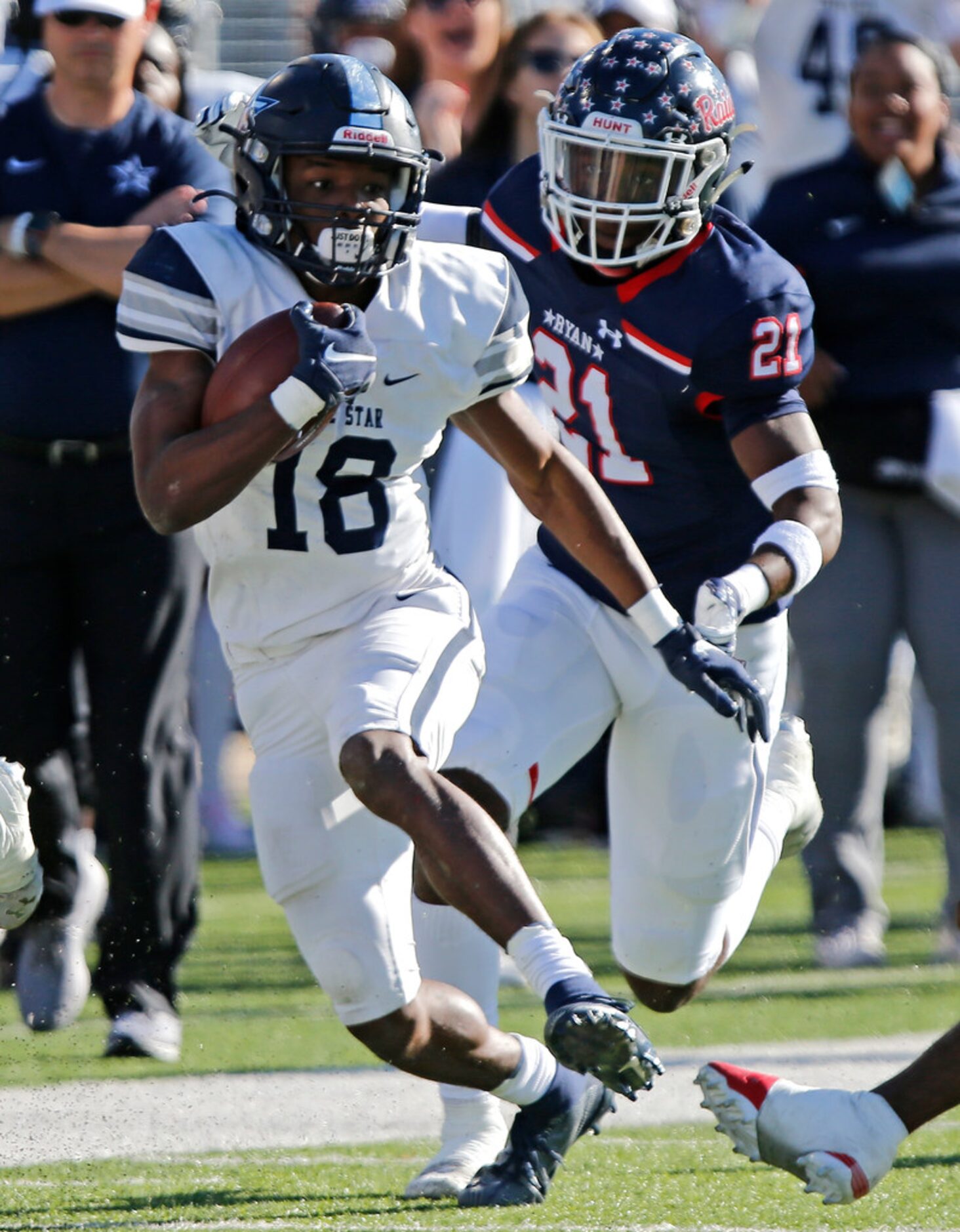 Lone Star High School wide receiver Marvin Mims (18) runs after a catch in front of Denton...