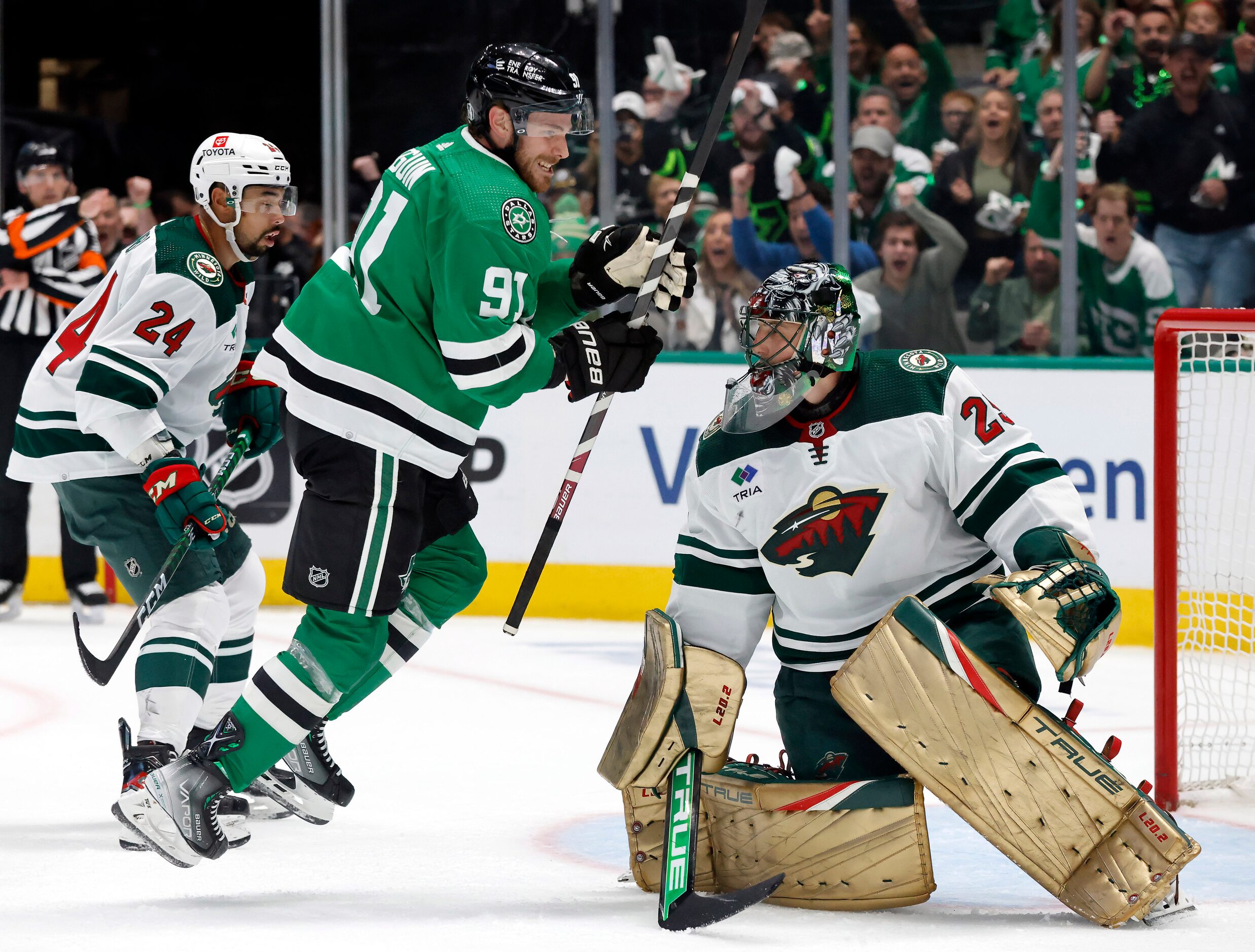 Dallas Stars center Tyler Seguin (91) reacts after scoring on Minnesota Wild goaltender...