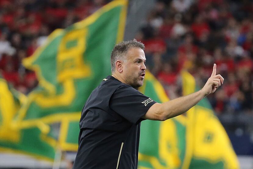 Baylor head coach Matt Rhule call a play to his team in the second half of an NCAA college...