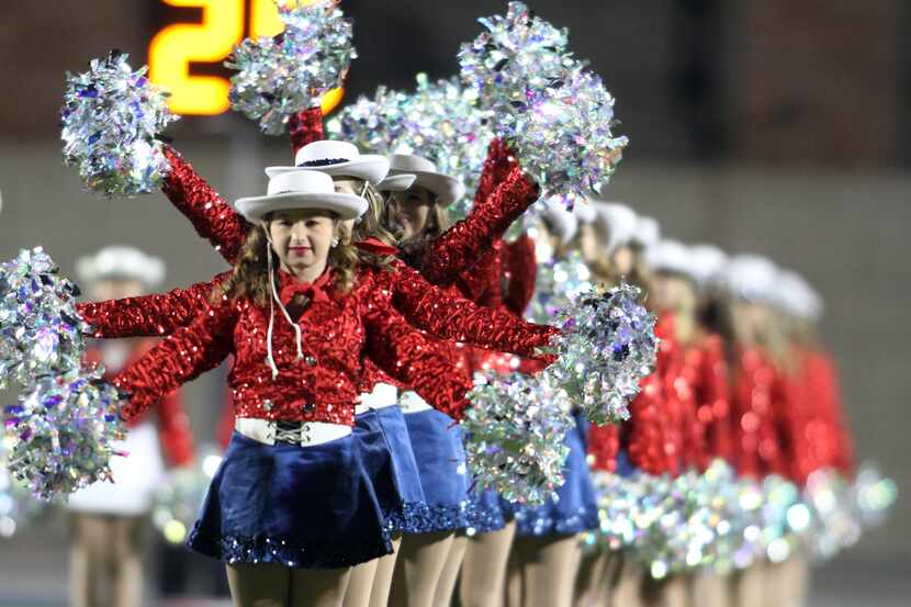 Madison Swagerty, a freshman at Allen High School performs with the Tallenettes before the...