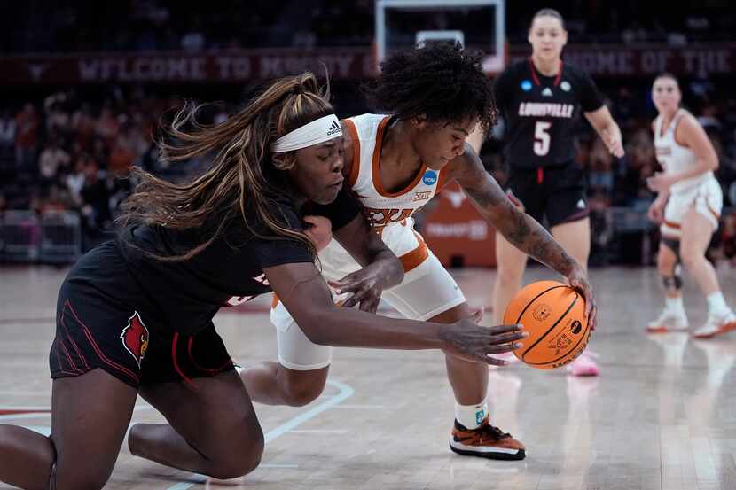 Louisville forward Olivia Cochran, left, and Texas guard Rori Harmon, right, chase a loose...