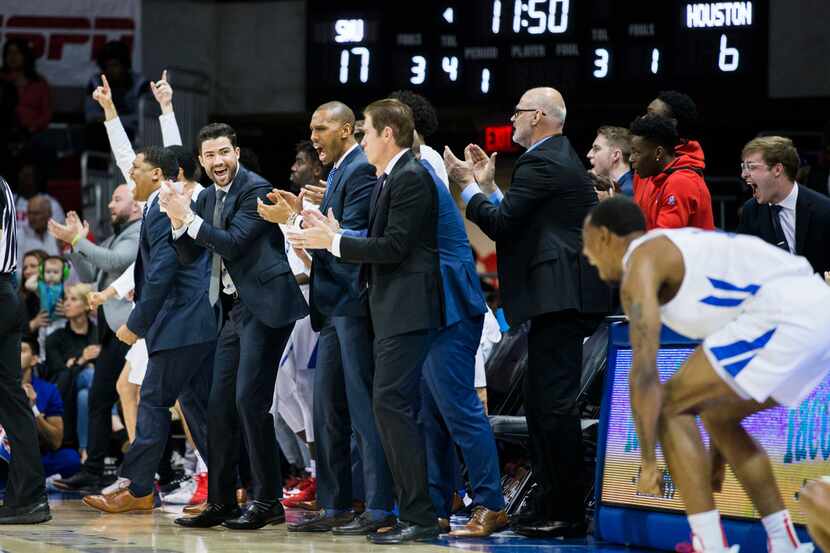 Southern Methodist Mustangs celebrate a point during the first half of a basketball game...