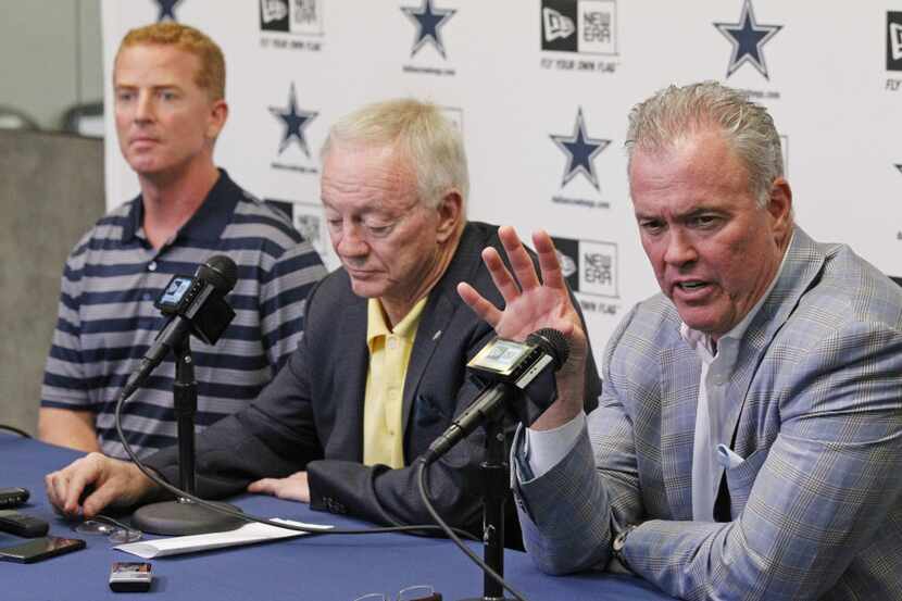 Dallas Cowboys coach Jason Garrett, owner Jerry Jones and and Executive VP Stephen Jones, at...