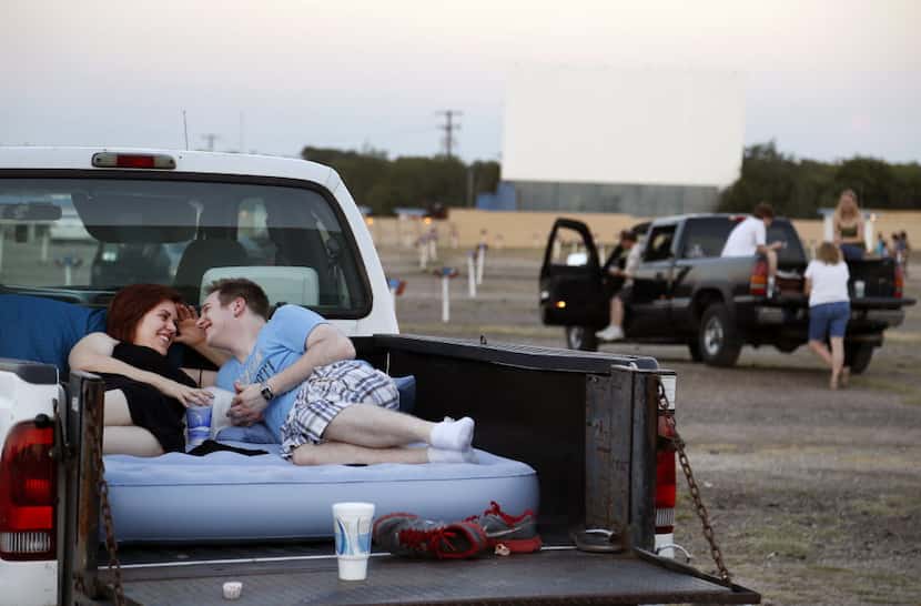 Rachel Leigh Marek and Andrew Shepherd  wait for their movie to start at the Galaxy Drive-In...