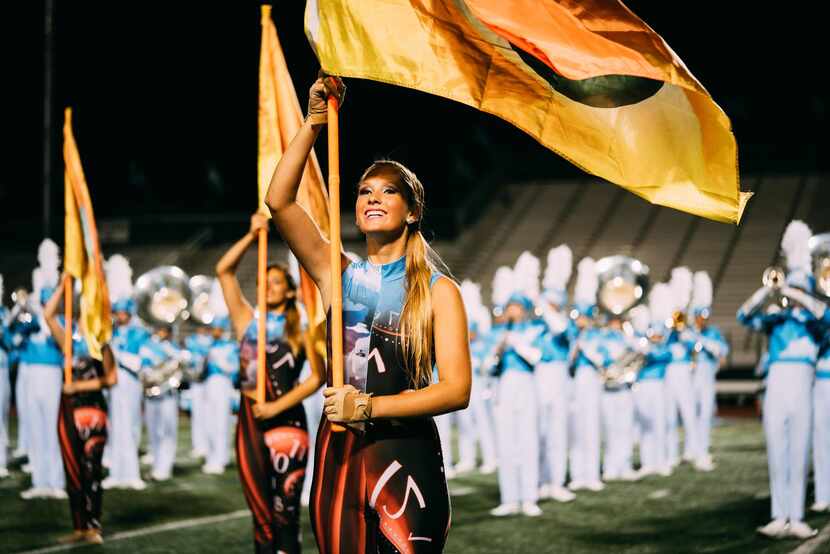 Flower Mound High School's marching band accumulated 92.75 points, placing first in general...