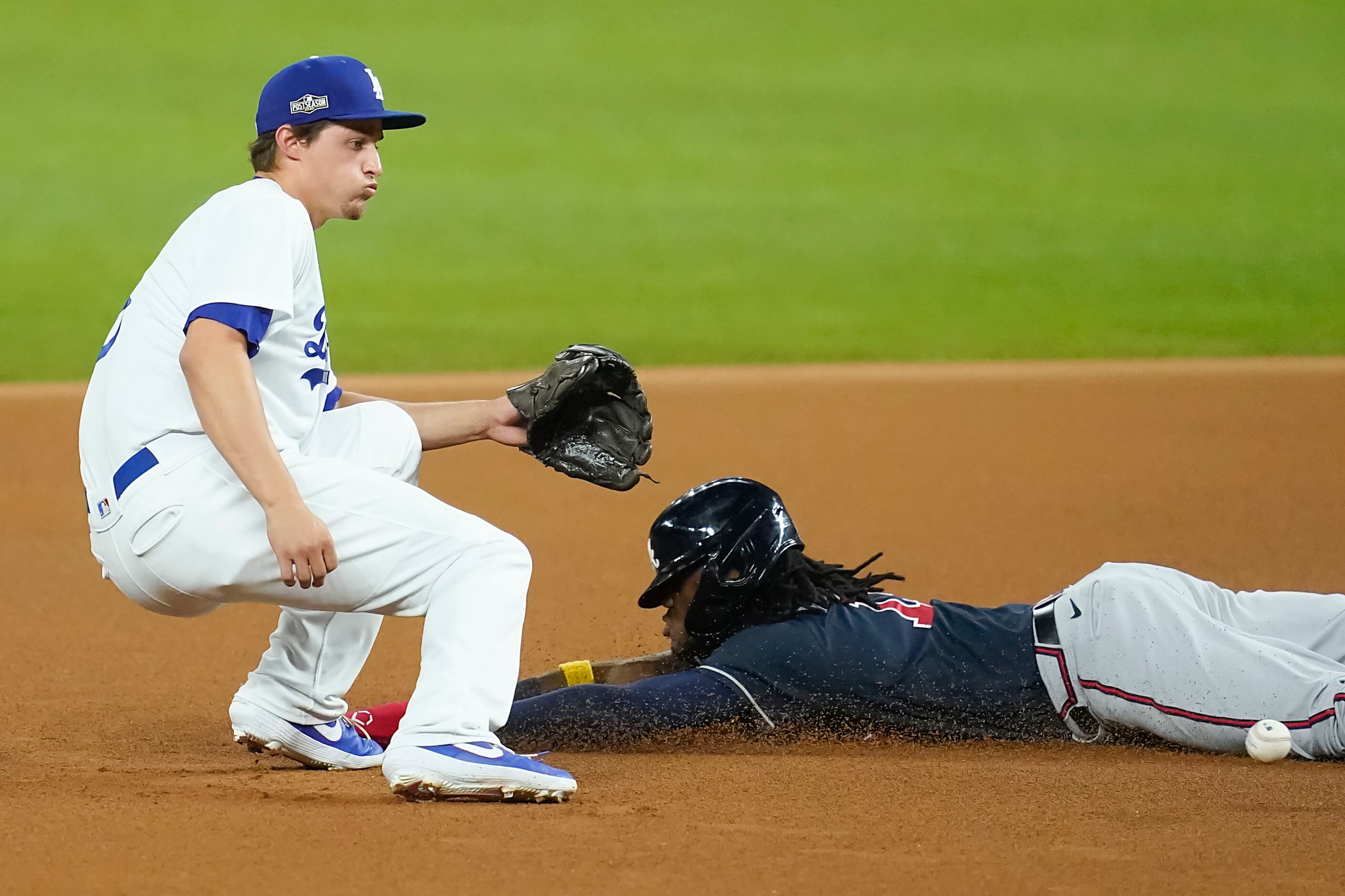 Atlanta Braves right fielder Ronald Acuna Jr. (13) steals second base ahead of the throw to...