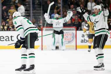 Dallas Stars center Roope Hintz (24), goaltender Jake Oettinger (29), and center Matt...