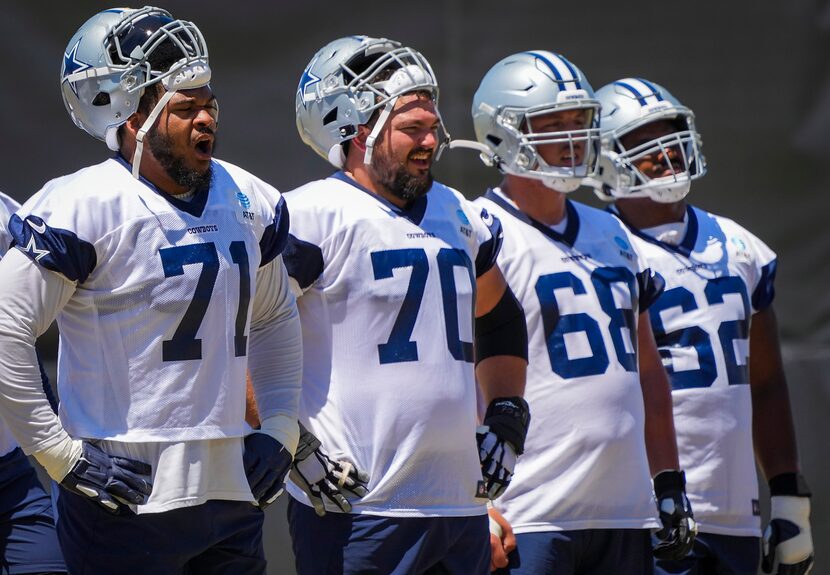 Dallas Cowboys tackle La'el Collins (71), guard Zack Martin (70), guard Matt Farniok (68)...