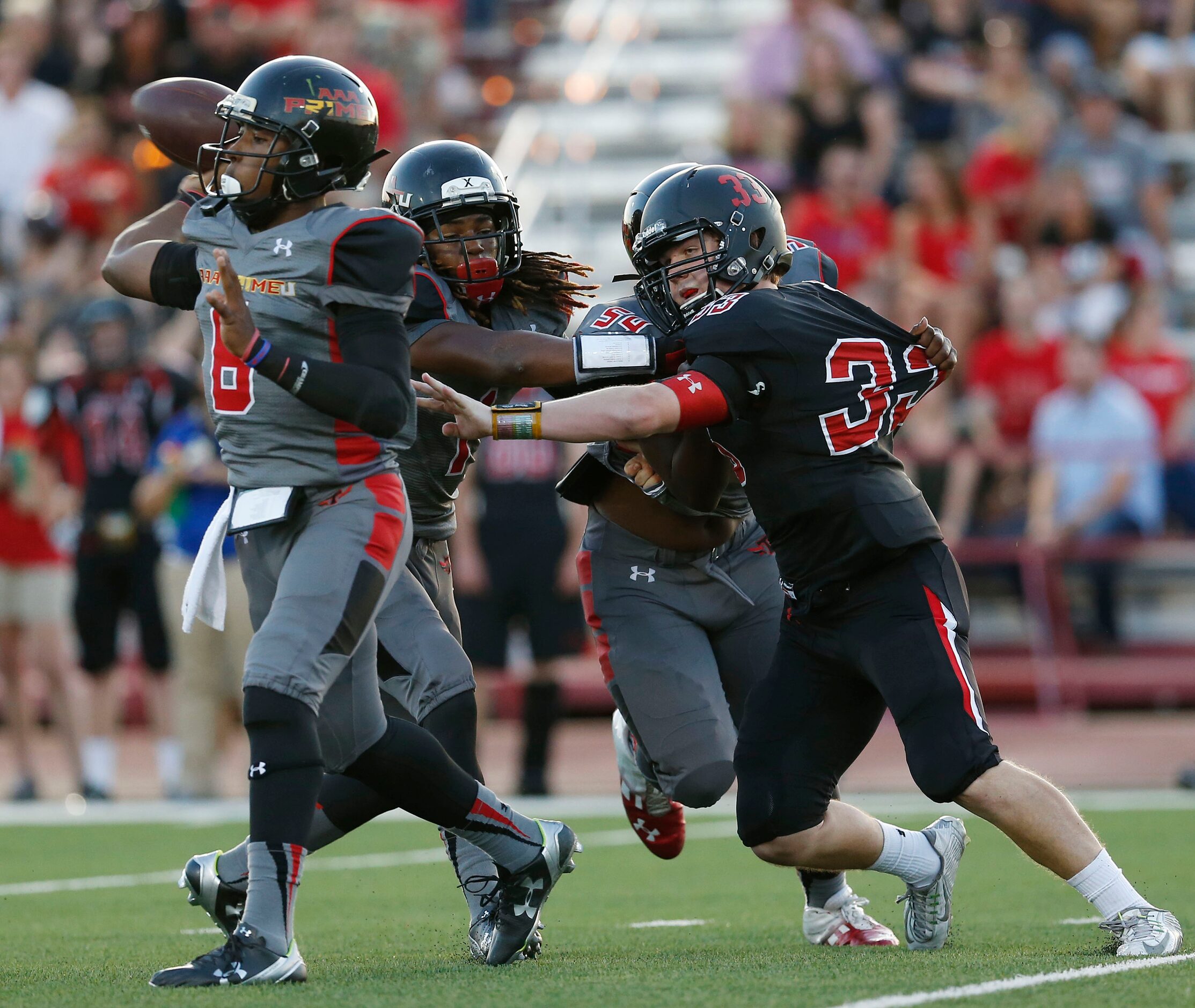 Fort Worth Christian linebacker Christian Neal (33) attempts to get to AAA Prime U...