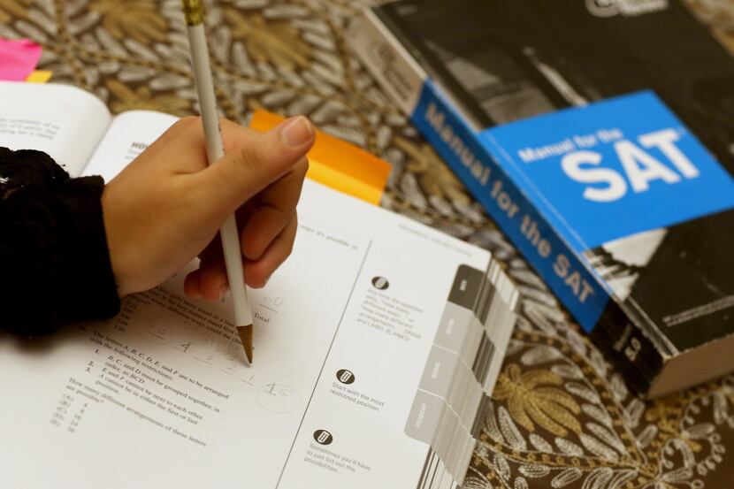PEMBROKE PINES, FL - MARCH 06:  Suzane Nazir uses a Princeton Review SAT Preparation book to...