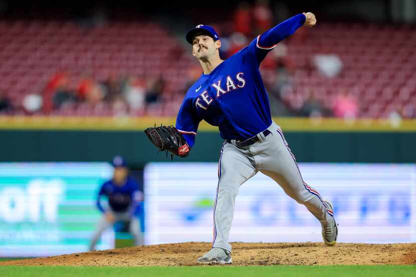 Texas Rangers' Cole Ragans throws during the eighth inning of the team's baseball game...