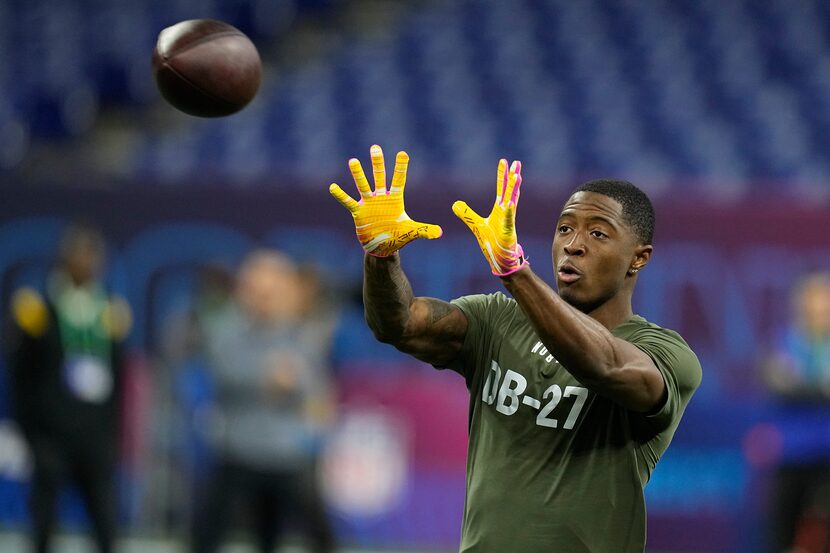 Toledo defensive back Quinyon Mitchell runs a drill at the NFL football scouting combine,...