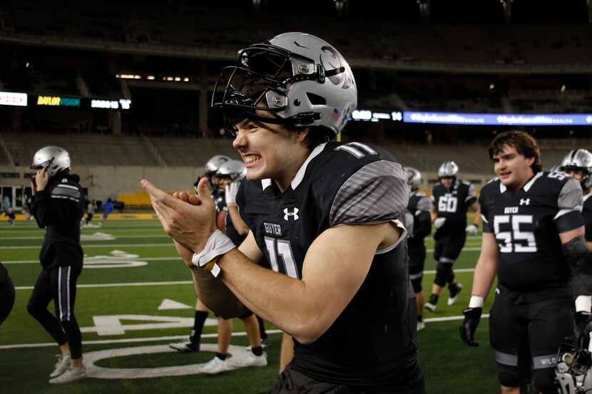 Denton Guyer quarterback Jackson Arnold (11) is unable to contain his excitement as he...