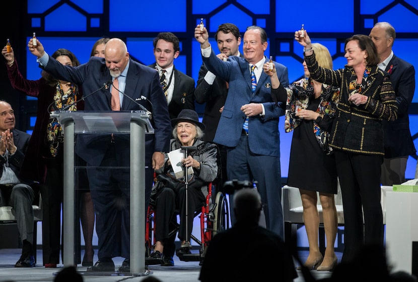 Family members, including wife Joan Kelleher, seated at center, of the late Southwest...