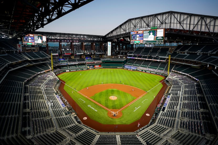 FILE - An overall view of the ballpark with the roof open as the Rangers host the Astros for...
