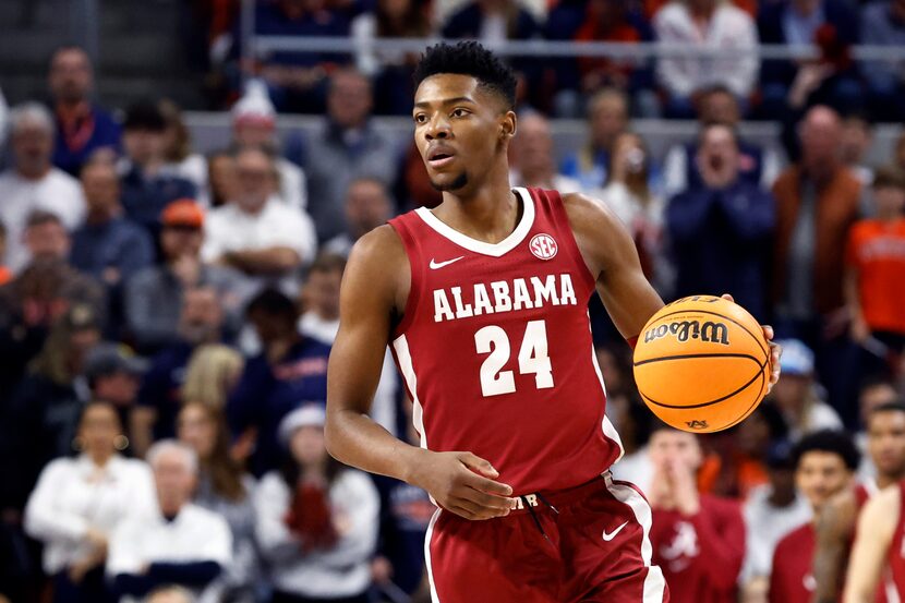 FILE - Alabama forward Brandon Miller brings the ball up during the first half of the team's...