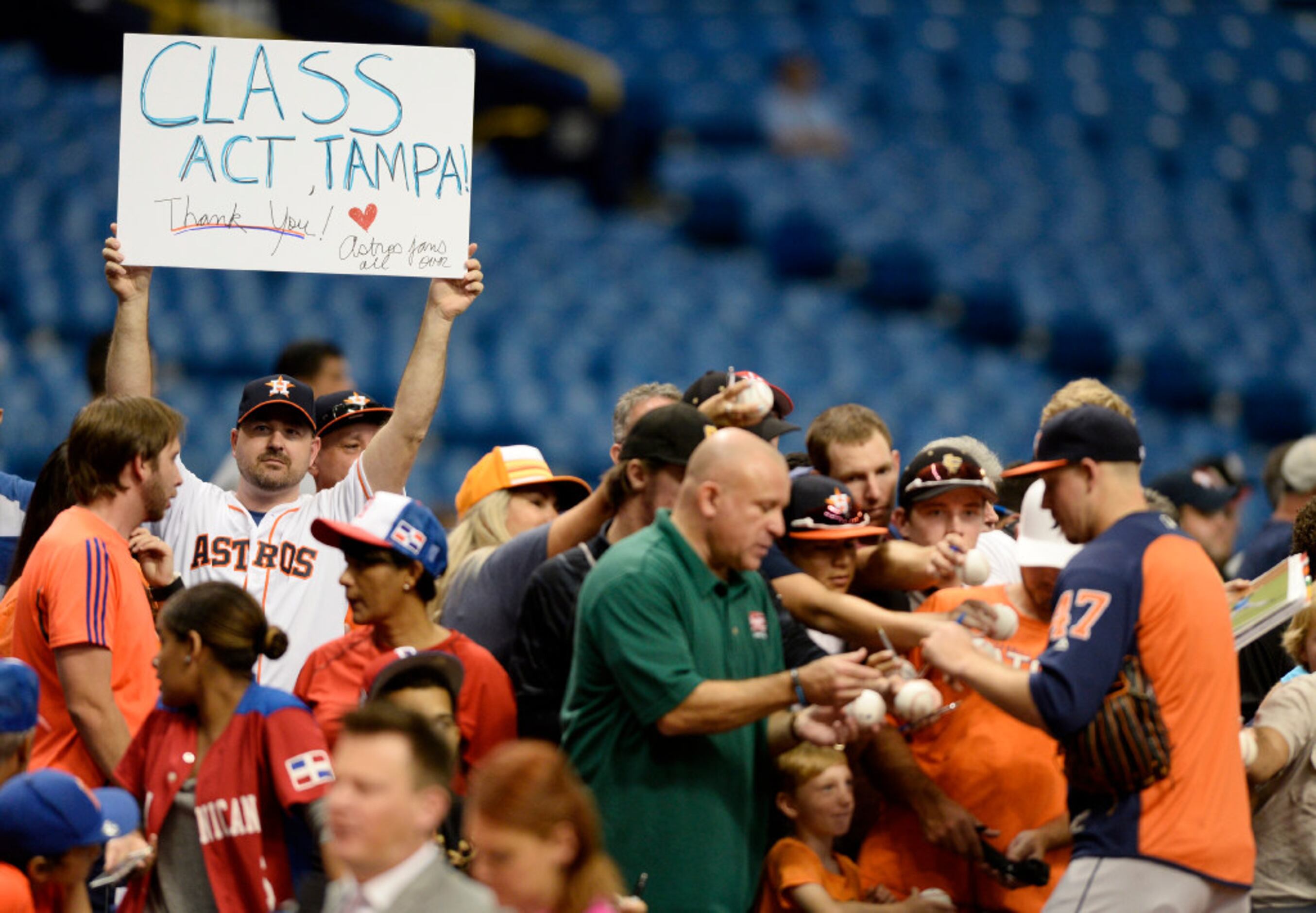 Astros family proudly wears orange in Yankee Stadium's right field