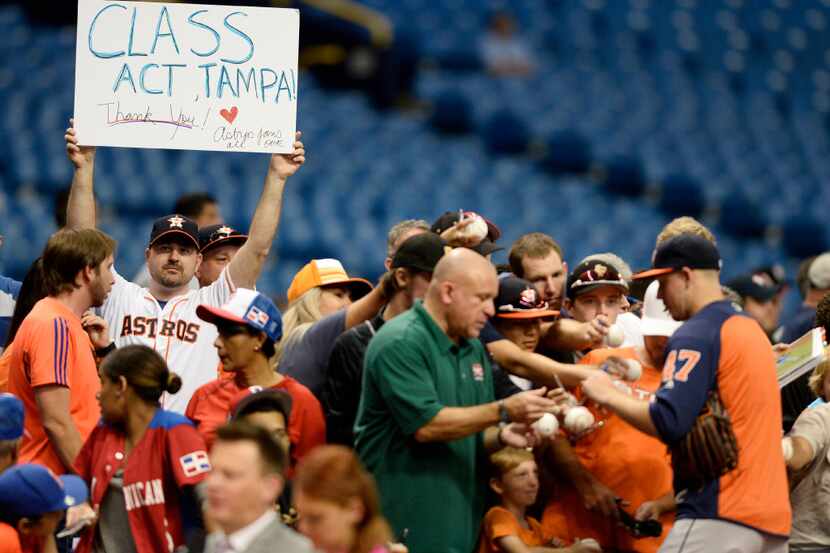 ST. PETERSBURG, FL - AUGUST 30:  An Astros fan thanks Tampa, as Chris Devenski #47 of the...