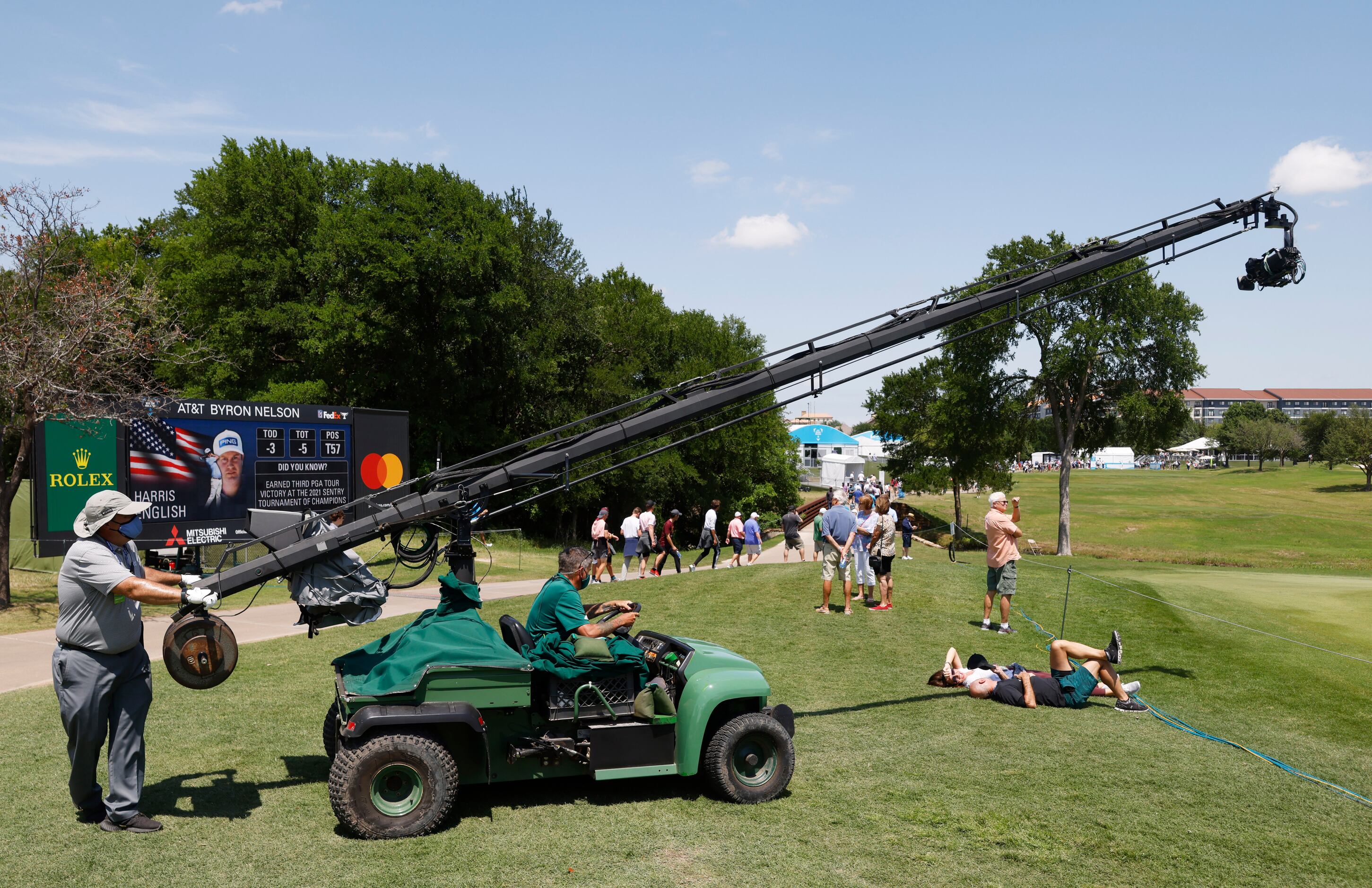 A camera crew works on moving out of the 7th hole during round 2 of the AT&T Byron Nelson ...
