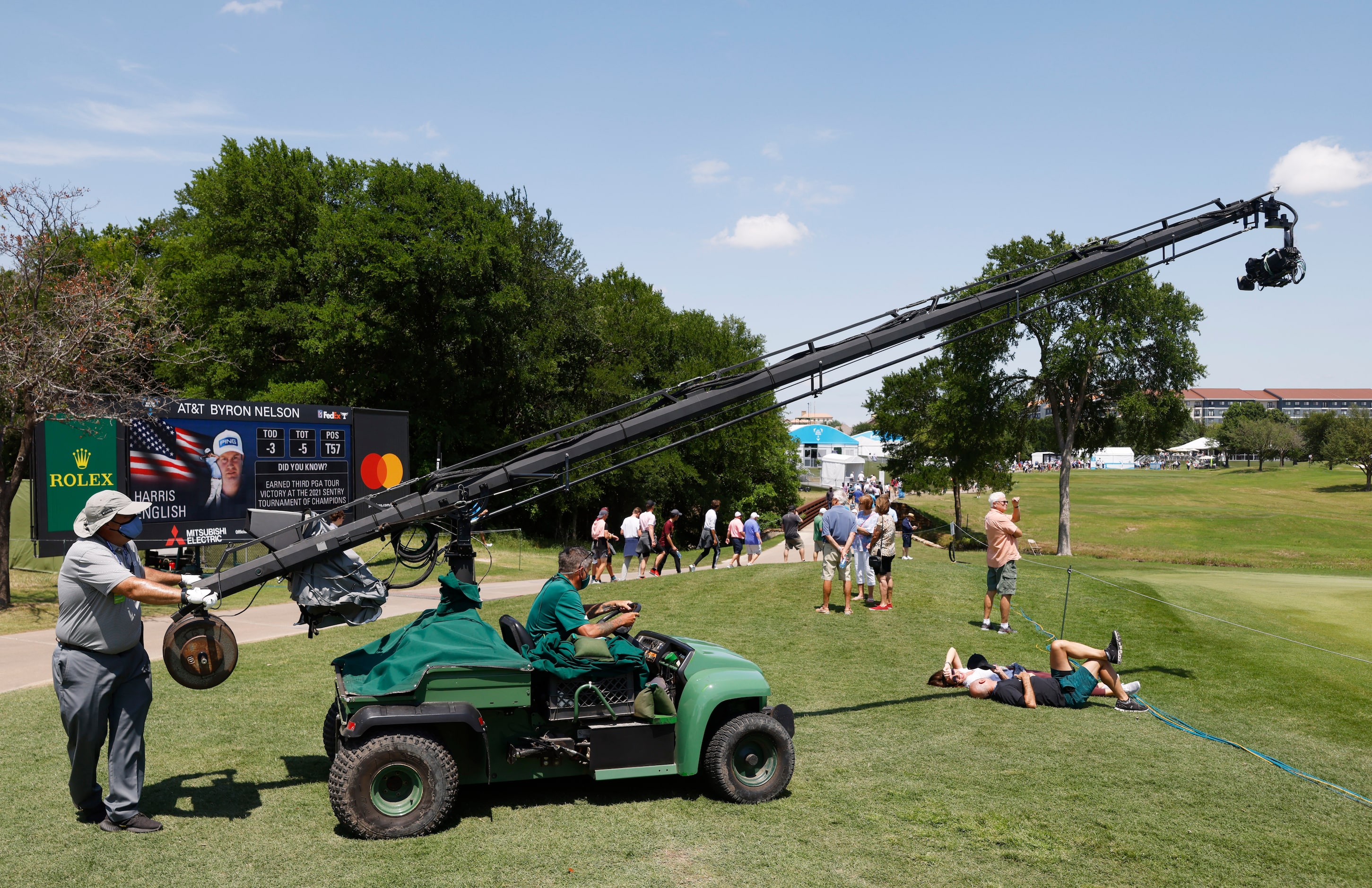 A camera crew works on moving out of the 7th hole during round 2 of the AT&T Byron Nelson ...