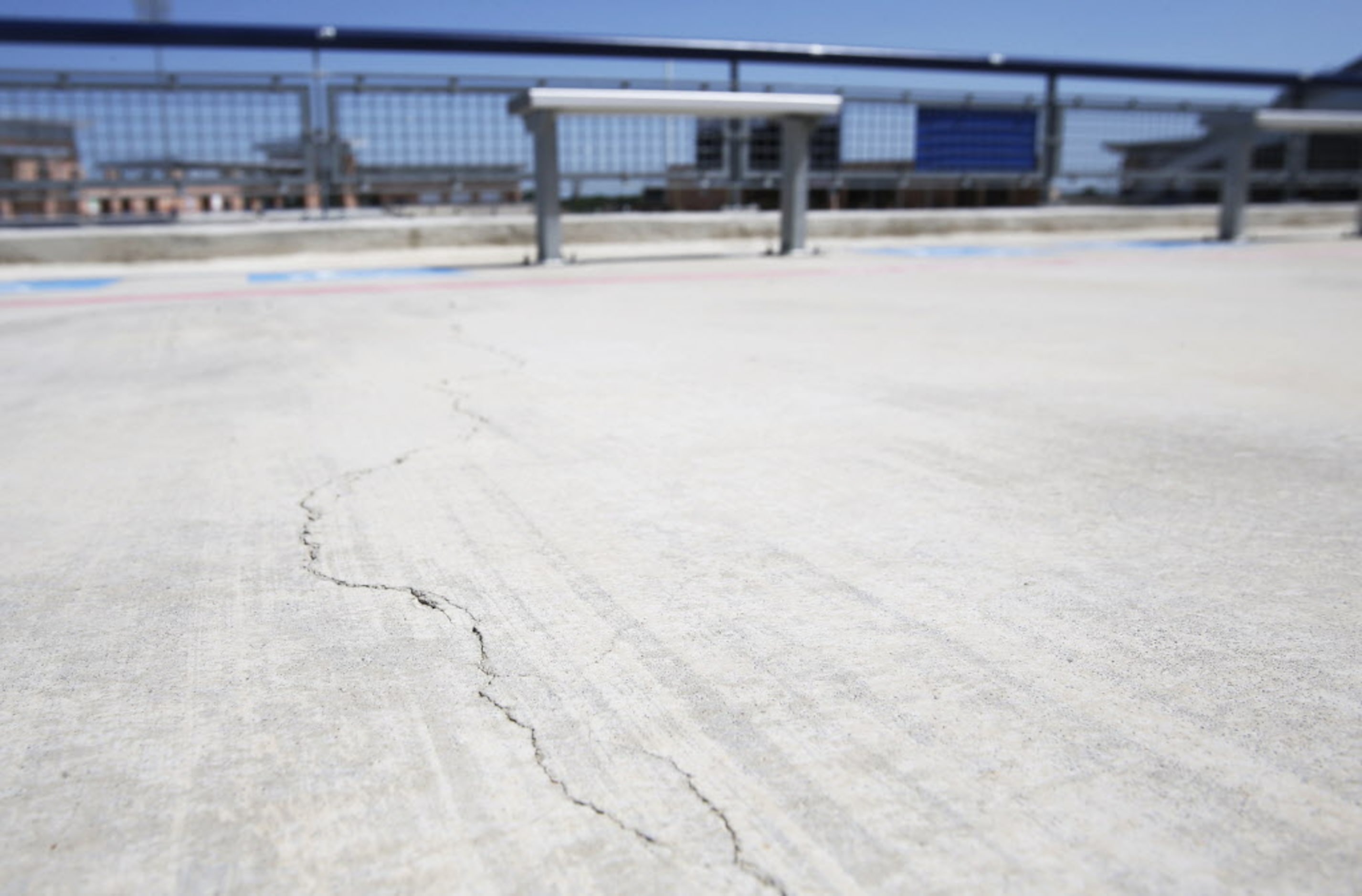 Some of the many cracks can be seen in this photo at Eagle Stadium in Allen, Texas on May...