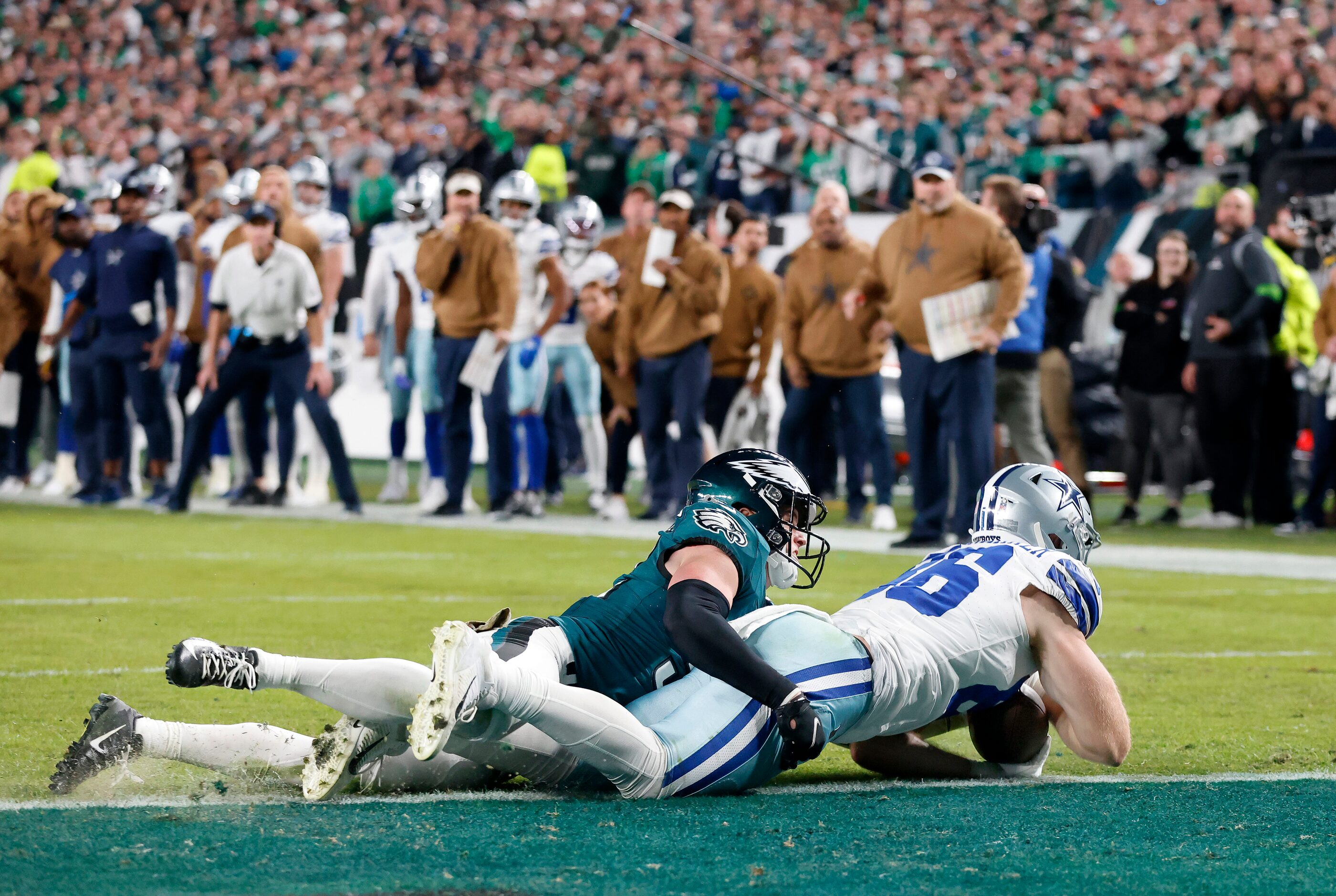 Dallas Cowboys tight end Luke Schoonmaker’s (86) knee is down on the goal line but the ball...