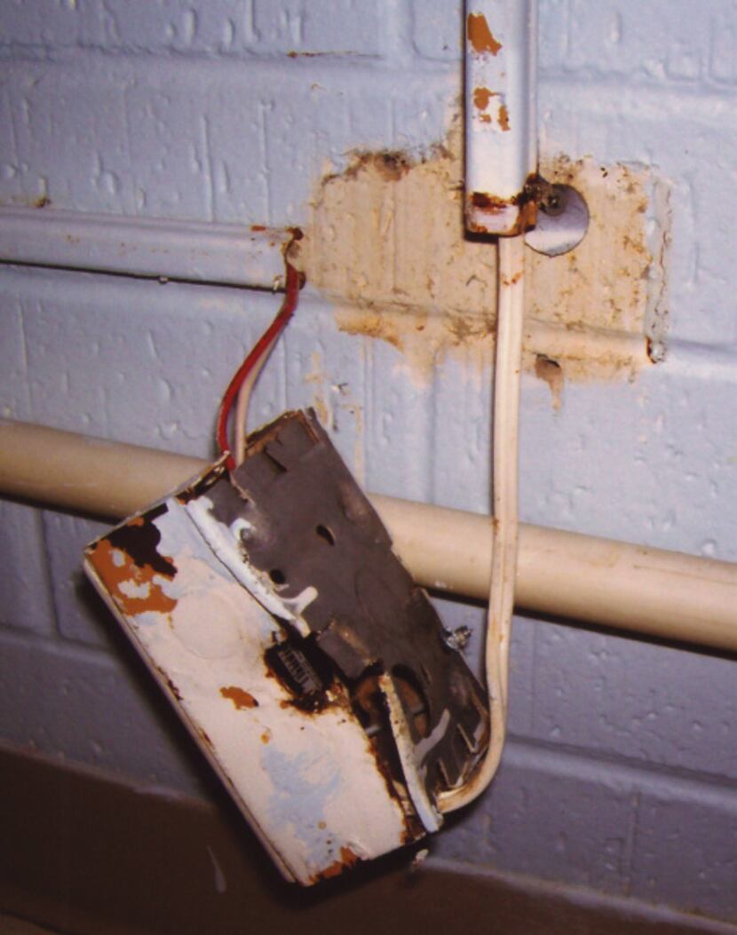 In a picture taken by the state in 2009, electrical wiring is shown at the Bridgeport Health...