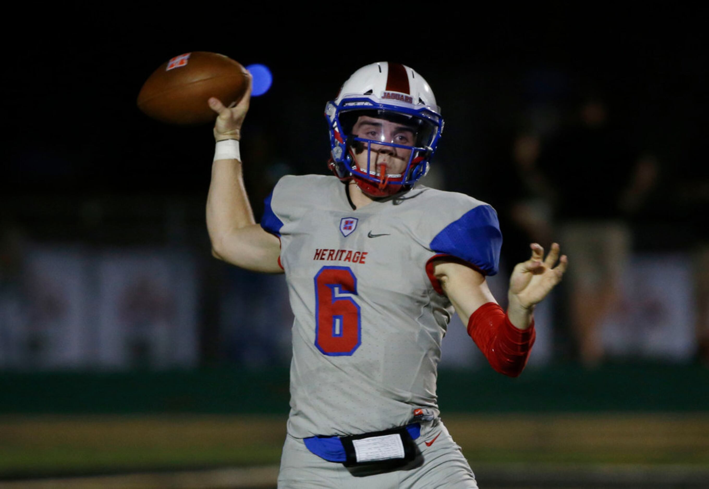 Midlothian Heritage quarterback Cade Sumner (6) throws a pass against Kennedale  during the...