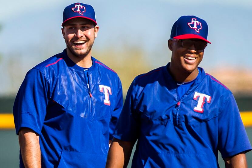 Texas Rangers third baseman Adrian Beltre (right) laughs with Joey Gallo while participating...