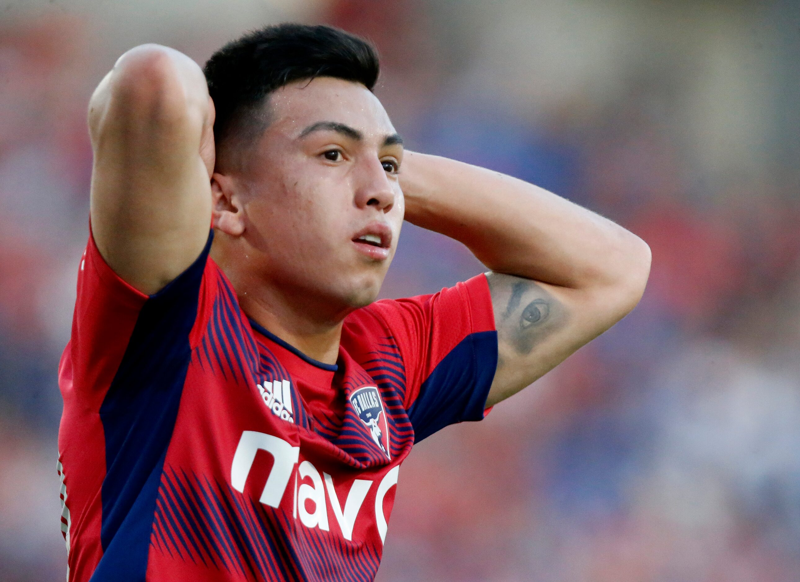 FC Dallas forward Alan Velasco (20) reacts to a missed scoring opportunity during the first...