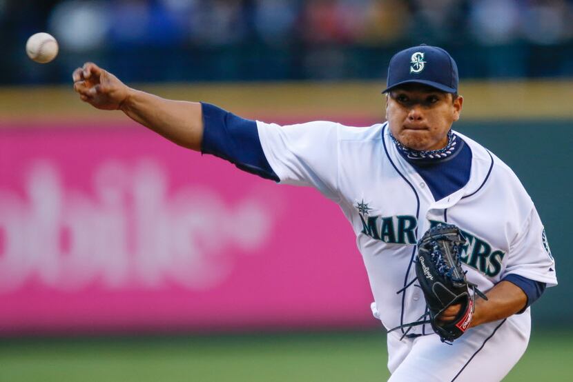 Pitcher Erasmo Ramirez #50 of the Seattle Mariners pitches in the second inning against the...