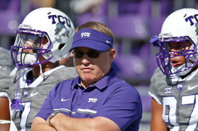TCU head coach Gary Patterson watches his players during an warm-up prior to the Iowa State...